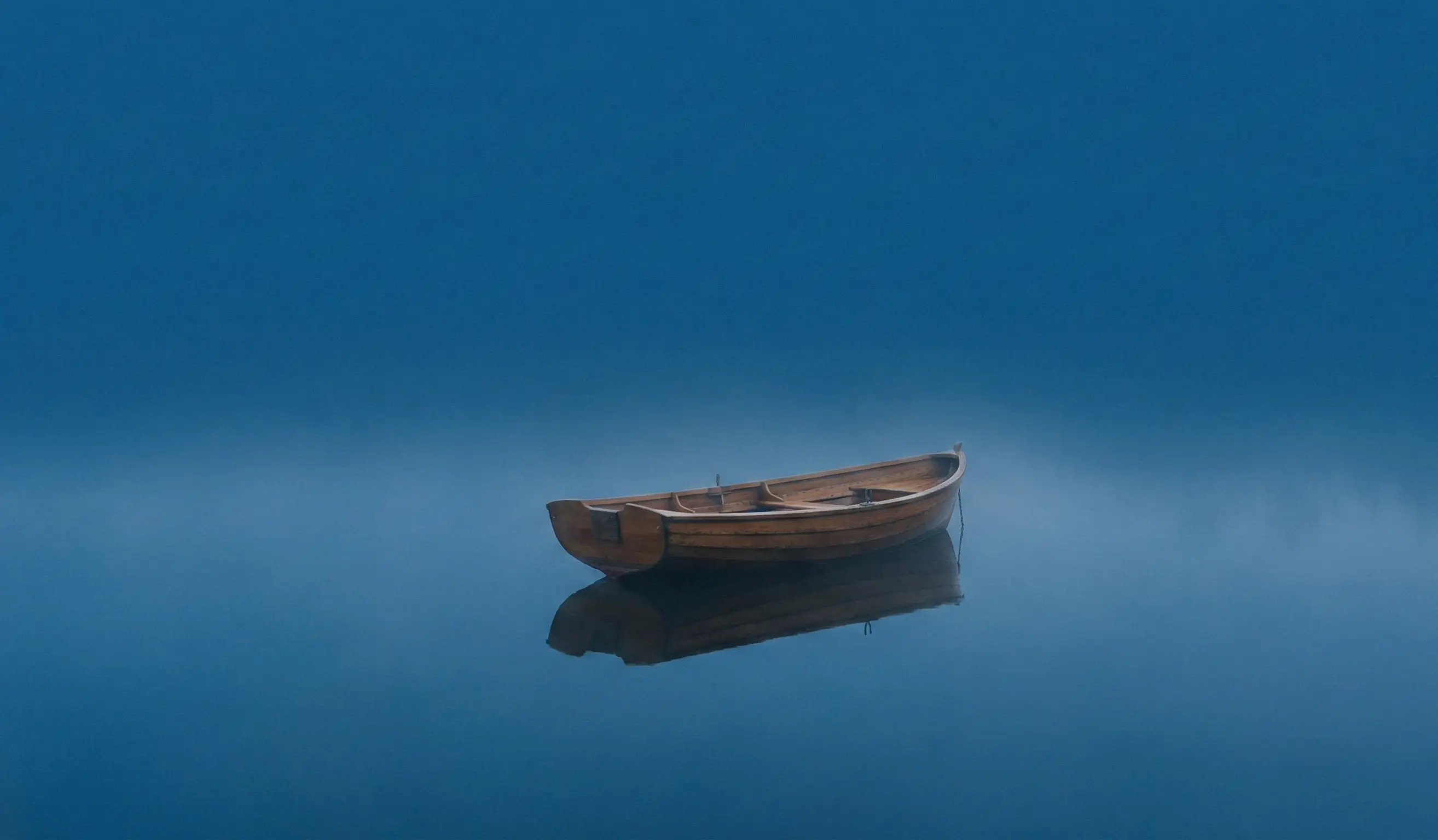 Cinematic shot of a coffee mug on bed sheets representing morning routine